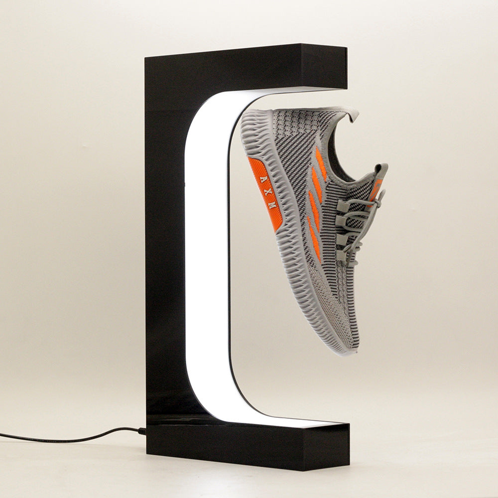 Présentoir à chaussures à lévitation magnétique avec rotation360°