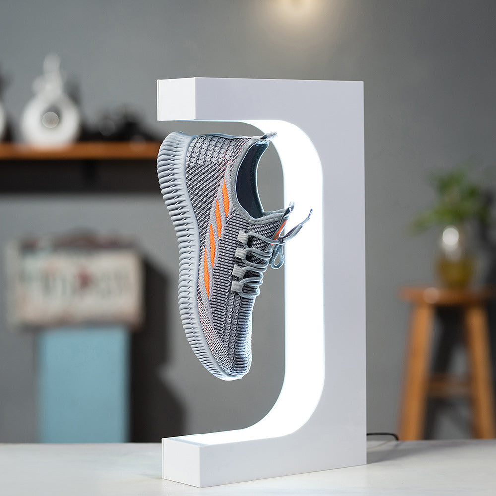 Présentoir à chaussures à lévitation magnétique avec rotation360°